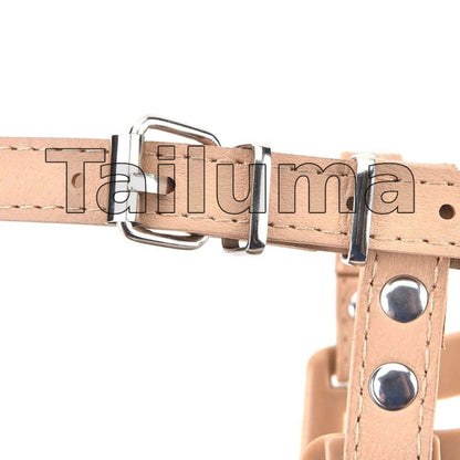 Close-up of an adjustable dog muzzle strap with a metal buckle. The strap allows easy size adjustment for a secure and comfortable fit.