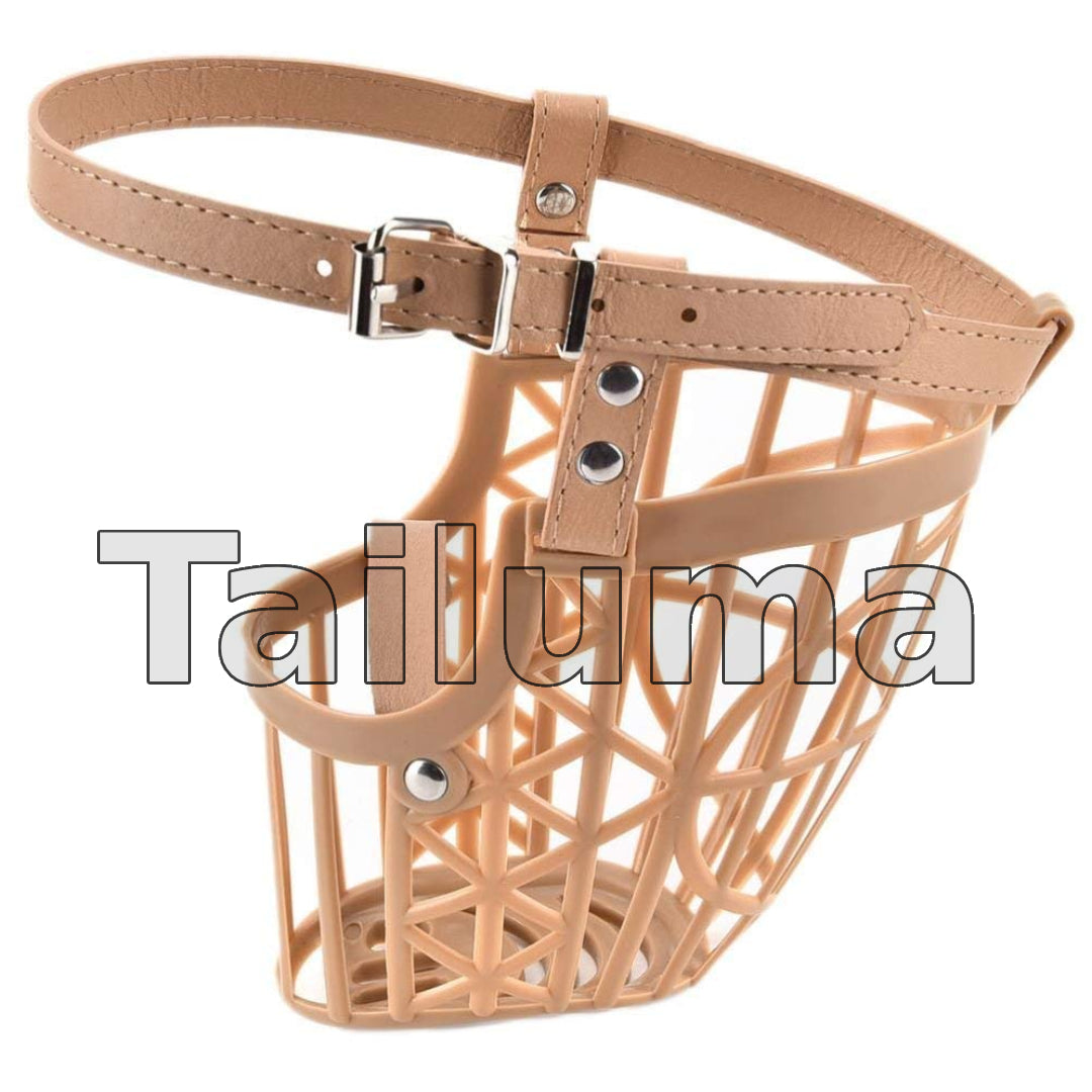 Beige basket-style dog muzzle with an adjustable strap and buckle. It is designed to prevent biting while allowing dogs to breathe comfortably.