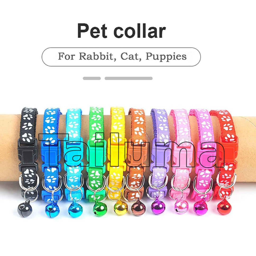 Multiple colorful pet collars with bells displayed on a hand. These adjustable collars are paw designed for rabbits, cats, and puppies.