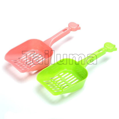 two plastic cat litter scoops in pink and green colors, designed for easy cleaning.