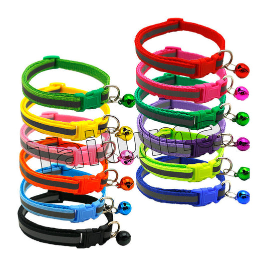 Multiple colorful reflective pet collars with small bells. These adjustable collars are designed for dogs and cats to improve visibility and safety.